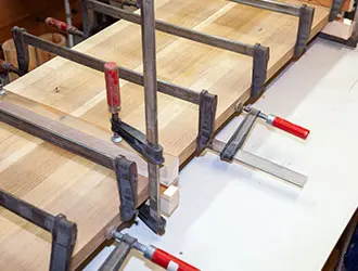 clamps holding a piece of wood